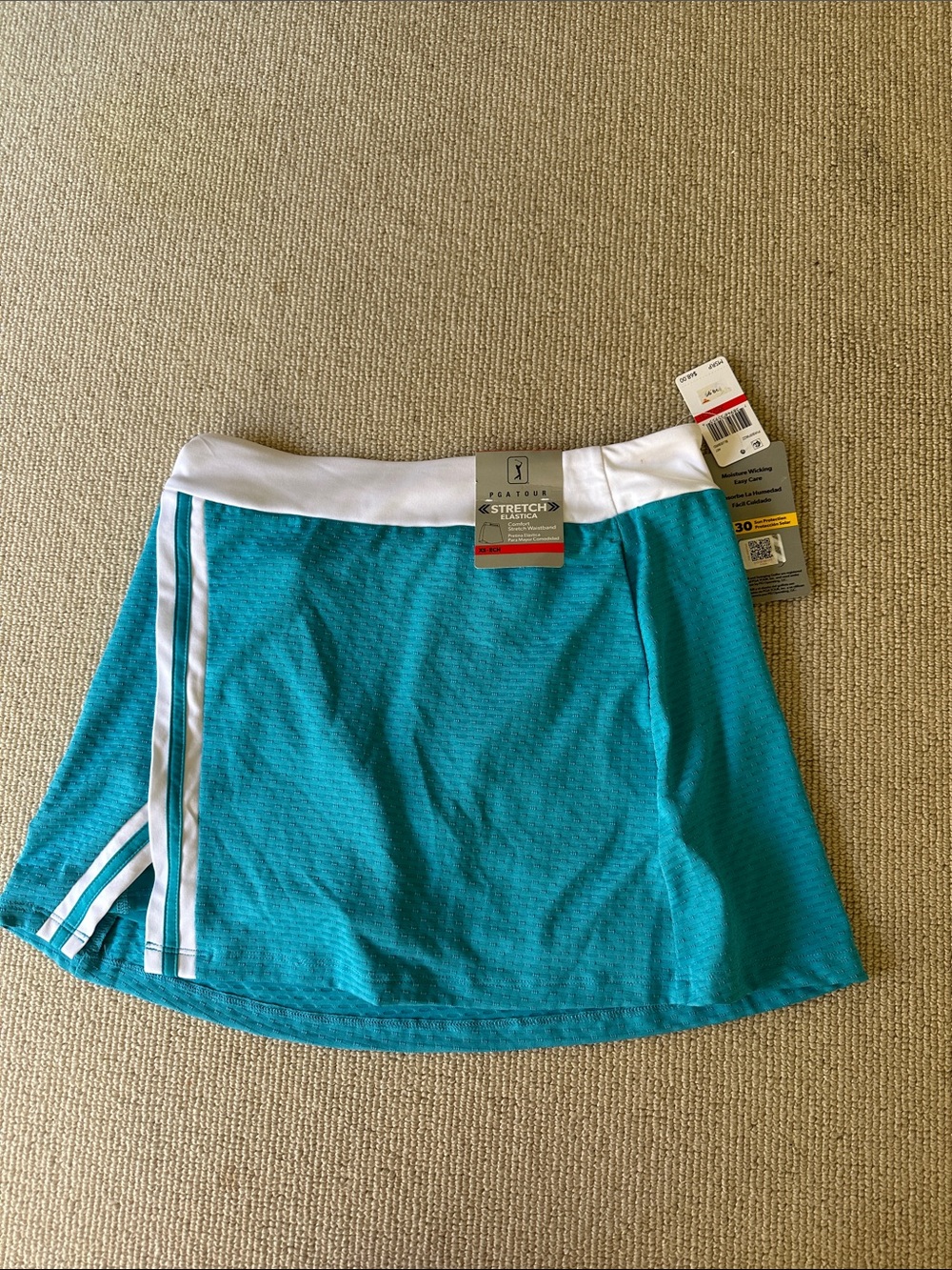 Pga superstore teal golf skort with white waistband and stripe xsmall